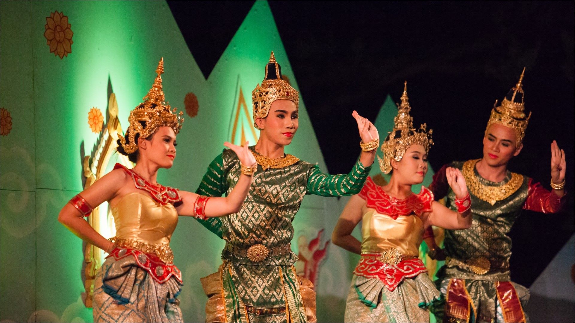 Women in costume performing traditional dance